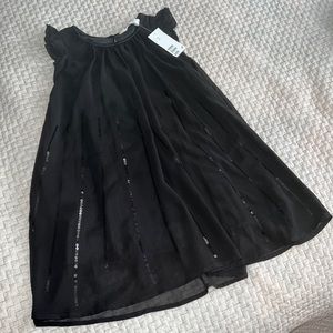 Girl’s H&M sequin dress size 4-5Y black.